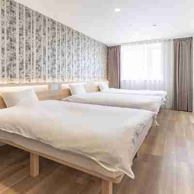 住一HOTEL関空店 Rooms