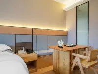 โรงแรมไมเตรีย บาติมานจู (สาขา สวนเชิงนิเวศหูเฉวียน) โรงแรมในไมล์