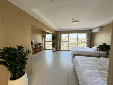 Wanyue Serviced Apartment Отели в г. Ишуй