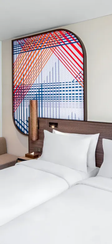 ห้องสุพีเรียร์พร้อมเตียงเดี่ยว 2 เตียงและระเบียง