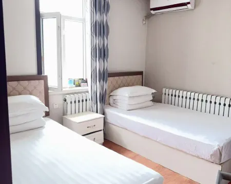 Huma Xinli Hotel Hoteles en Huma