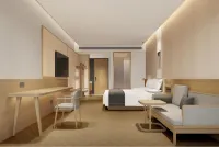 Jianguo HIDDEN Hotel (Hangzhou Binjiang Xingguangdadao) Отели в г. Ханчжоу