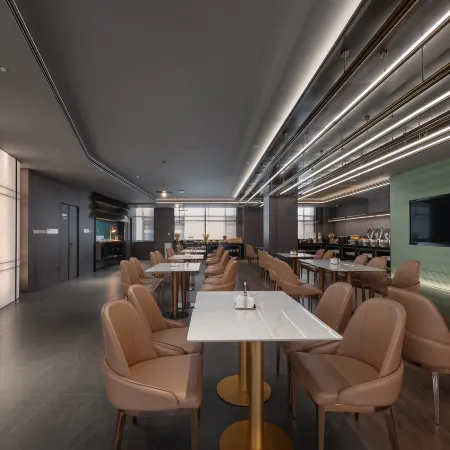 Qiyue International Hotel (Longgang Dayun Branch) Отели рядом с достопримечательностью «Biadi Share Co. ООО.»
