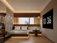 Huiyu·Xinduo Hotel (Mengzi Wencui Road Honghe Prefecture Government) Hotels in Mengzi