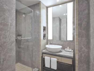 新装されたグランドデラックスウォーターフロントツインルーム グランド コプソーン ウォーターフロント シンガポールの写真