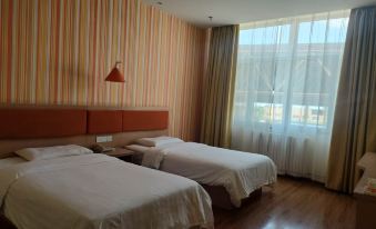 Homeinn Pebble Hotel (Qitai Beimen Commercial Center)