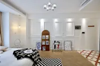 Qihai Shijia Apartment (May Fourth Square Wanxiangcheng) Hotels in Badestrand Nr. 1 und Landschaft bei Badaguan