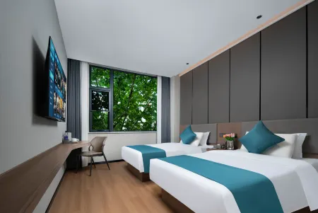 Zhengzhou Aikenia Hotel (27 Wanda Zhengzhou Station) Отели рядом с достопримечательностью «University for Science & Technology Zhengzhou»