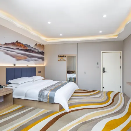 Xinmi Golden Triangle Business Hotel (Zhongqiang Light Year City Plaza)