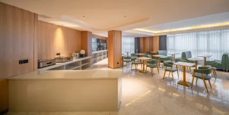 Deyang lingyuan Holiday Inn (Moore Plaza) Отели в г. Дэян