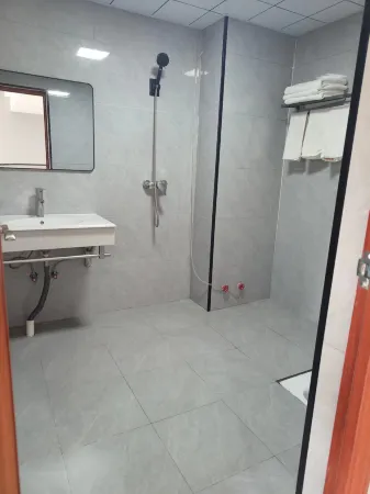 Luxi Dihao Business Hotel Отели рядом с достопримечательностью «Xiao Square»