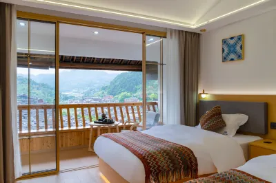 Yixiangju Homestay (Xijiang Qianhu Miao Village Observation Deck Branch) Hotels near Ayouminzu Culture Museum