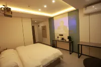 Menghai Xingqijiu Hotel - 2 tähden