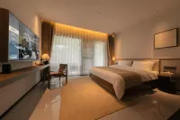 Xishuangbanna Jinghong Yakatu Theme Inn (Mengle Dafo Temple) Ξενοδοχεία στην πόλη Mannongfeng International Tourist Resort