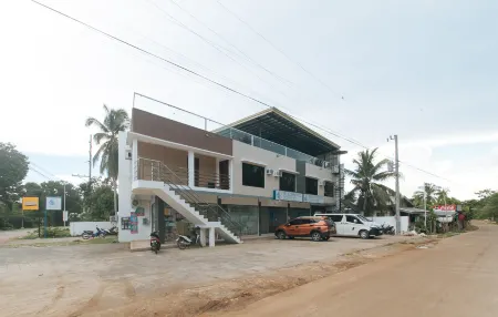 RedDoorz @ Happy Stay Apartelle Отели рядом с достопримечательностью «Панглао»