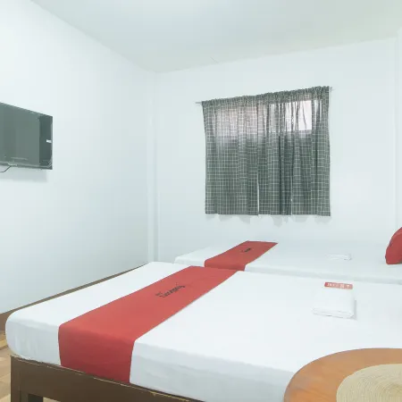 RedDoorz @ Joels Apartelle Hotels in Биньян