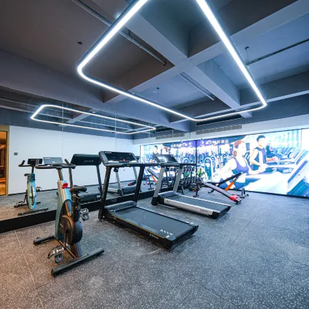 PK E-Sports Hotel (Jinjiang Guoji Jichang Yangguang Guangchang, Quanzhou)