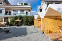 Xiluoya Luxe Natural Sulfur Hot Spring Tide Surfing Camping Ocean Style Smart Hotel (Niujie Branch)