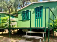 Village Camping Santa Fortunata - Campogaio Отели рядом с достопримечательностью «Пляж Леонеллис»