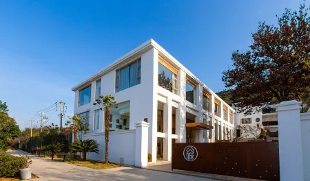 Taimei Xuelv Guesthouse Отели рядом с достопримечательностью «Shanghai Customs College Suzhou Branch»