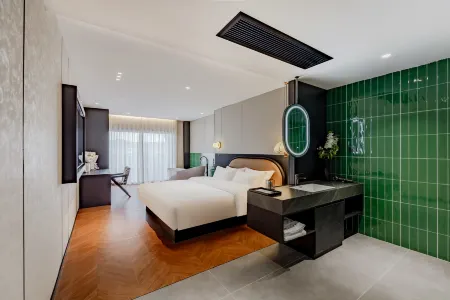 Wuyuan Jindu Mihe Hotel (Wuyuan High-speed Railway Station Branch) Отели в г. Уюань