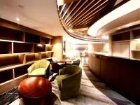 Qingdao Jiaodong Airport Flying Guest Hotel Overnight Rest Area Inn - bar