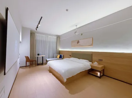 Xi Jian Homestay (Xinxiang Baolong Square Branch) Отели рядом со станцией Xinxiang East Railway Station