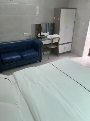 Yijia Apartment Hotels near Machongzhen Bus Passenger Transport Station