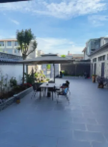 Shidian Jiu Yi Courtyard Hot Springs Chinese Inn