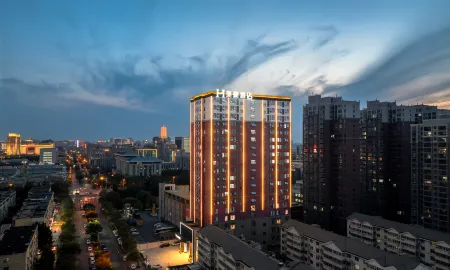 Mehood Theater Hotel (Zhengzhou East Railway Station Provincial Government Branch) Отели рядом с достопримечательностью «Henan Agricultural University (Longzihu Campus)»