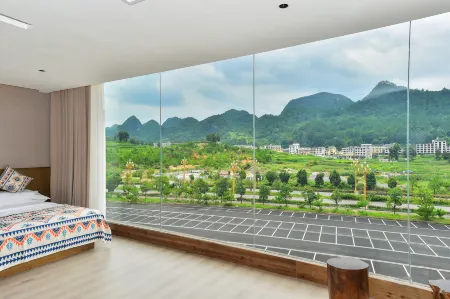 Yunduo Meiyuan (Libo Xiaoqikong West Gate) Отели рядом с достопримечательностью «Wolong Pond»