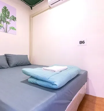 ห้องพักเตียงเดี่ยว ( ห้องน้ำรวม )