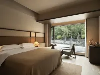 Jiuzhaigou · Mistshroud Mountains & Sunset Glow Snowscape · Sukoon Village Hotels in Jiuzhaigou