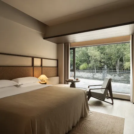 Jiuzhaigou · Mistshroud Mountains & Sunset Glow Snowscape · Sukoon Village Hotels in Jiuzhaigou