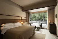 Jiuzhaigou · Mistshroud Mountains & Sunset Glow Snowscape · Sukoon Village Hotels in Jiuzhaigou