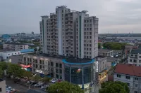 Magnolia Hotel (Kunshan Zhangpu Hanglong Plaza)