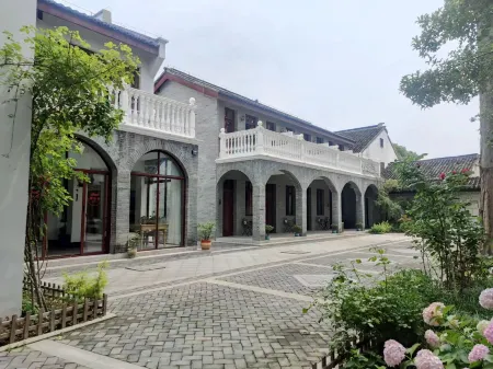 Wuzhong District Yuanzhiqing Xinyouyuan Homestay Отели рядом с достопримечательностью «Wansheng Rice Merchants»