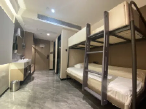 Kumamoto E-sports Hotel (Queshan Jingyu Plaza) Hotels in Queshan