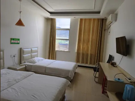 Feixian Lulushun Hotel Отели рядом с достопримечательностью «Yimeng Mountain Inzone Tianmeng Tourist Area»