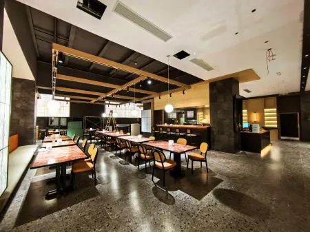 Shanghai Xujiahui 80,000 Stadium Quli Hotel Отели рядом с достопримечательностью «Longhua Temple»