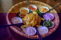 Qixin Smart Hotel (Wanning High Speed Railway Station)