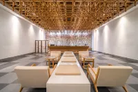 Moshe Hotel (Zhengzhou East Railway Station Mixc Store)