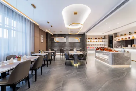 Homeinn Plus Hotel (Ordos Dongsheng Wanda Plaza) Отели рядом с достопримечательностью «Yike Zhaomeng Monument»