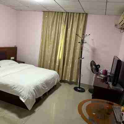 Huanghui Business Hotel (Renhe Road) Rooms