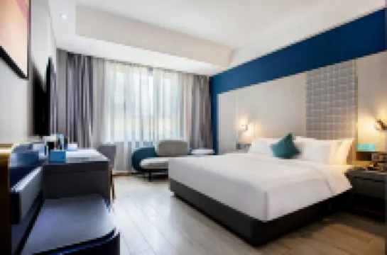 โรงแรมโฮมอินน์ เฟอรี่แลนด์ (ถนนเทียนซานตะวันตก คู่เอ่อเล่อ)