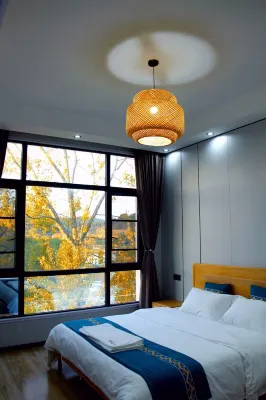 Zhimeijia Homestay - Kitchens