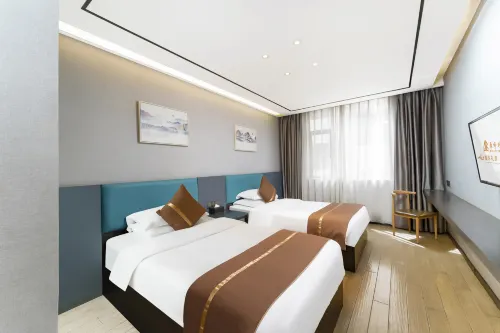 Dingfeng Times Hotel (Ganzhou Economic Development Zone Wanda Plaza Branch) - 2 stjerner