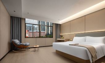 Yiyang Qianyi Hotel (North Branch of City College)