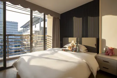 ​Zhuosheng Audio-Visual Service Apartment Hotels near Shenzhen Polytechnic (Xilihu Campus)