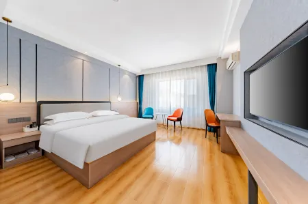 Baotou Yidu Hotel (Paradise) Отели рядом с достопримечательностью «Inner Mongolia University of Science & Technology»